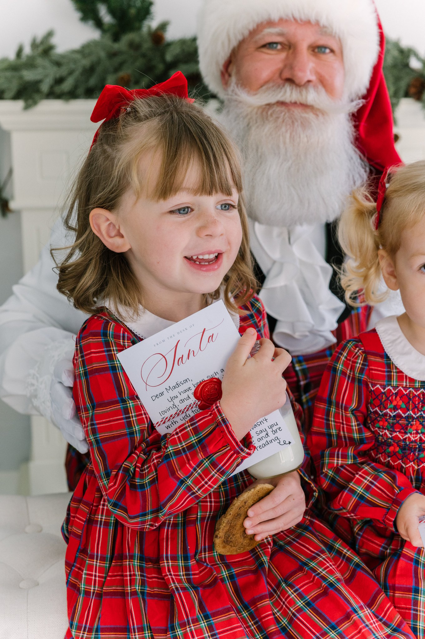 Christmas in Dallas with a young girl holding a letter from Santa.